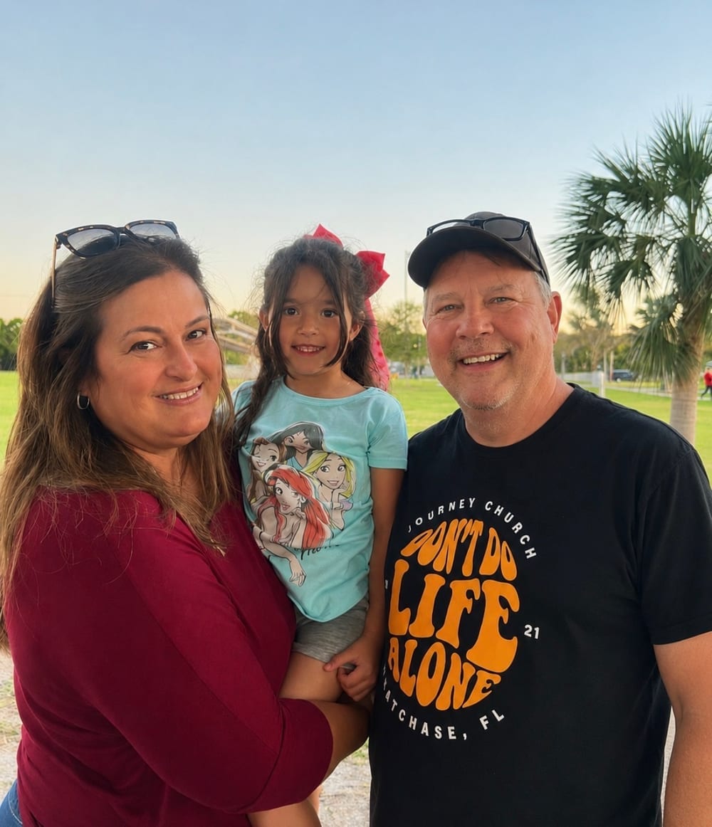 Owners Mike Shepherd and Bettina Savorelli with their granddaughter at a Tampa Bay park
