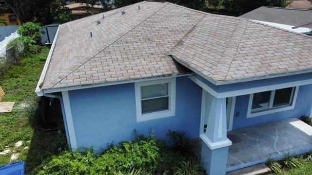 Chateau Green Shingle Upgrade. Before