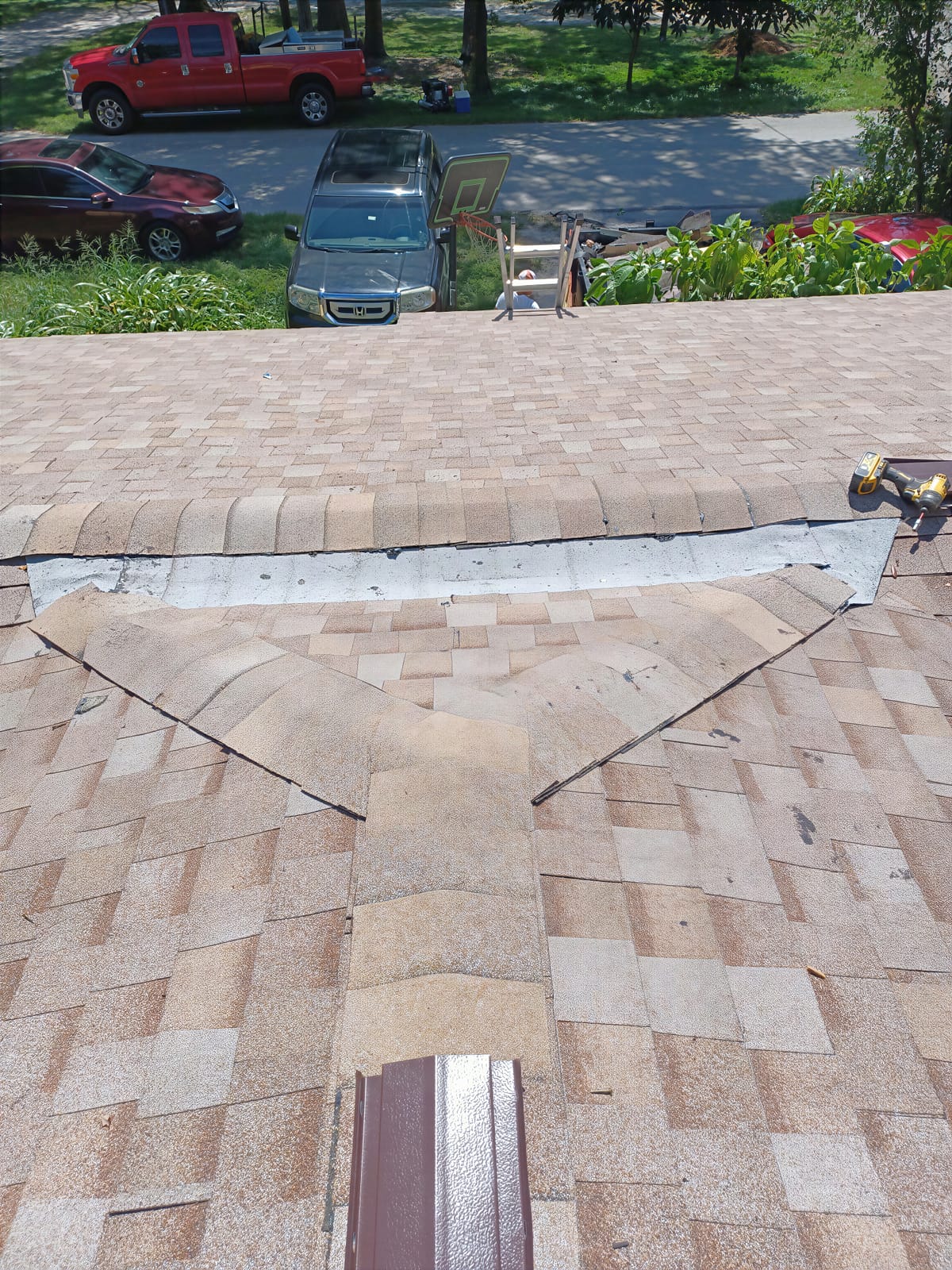 Shingle roof ridge repair by Integrity Roofing of Florida in Tampa Bay