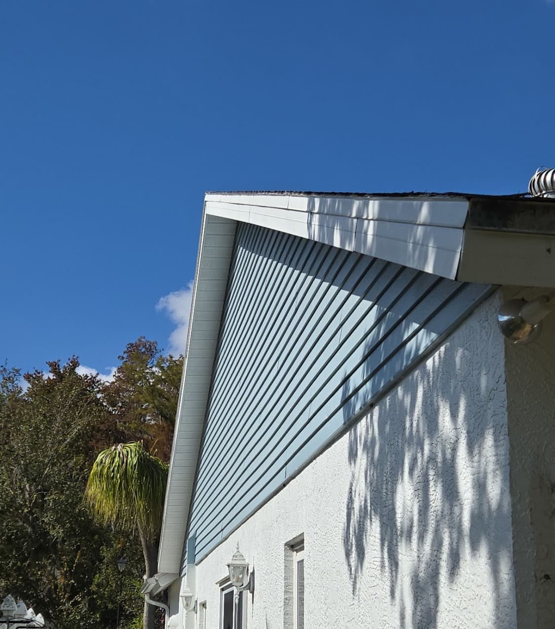 New architectural shingle roof on a New Port Richey, FL home installed by Integrity Roofing of Florida