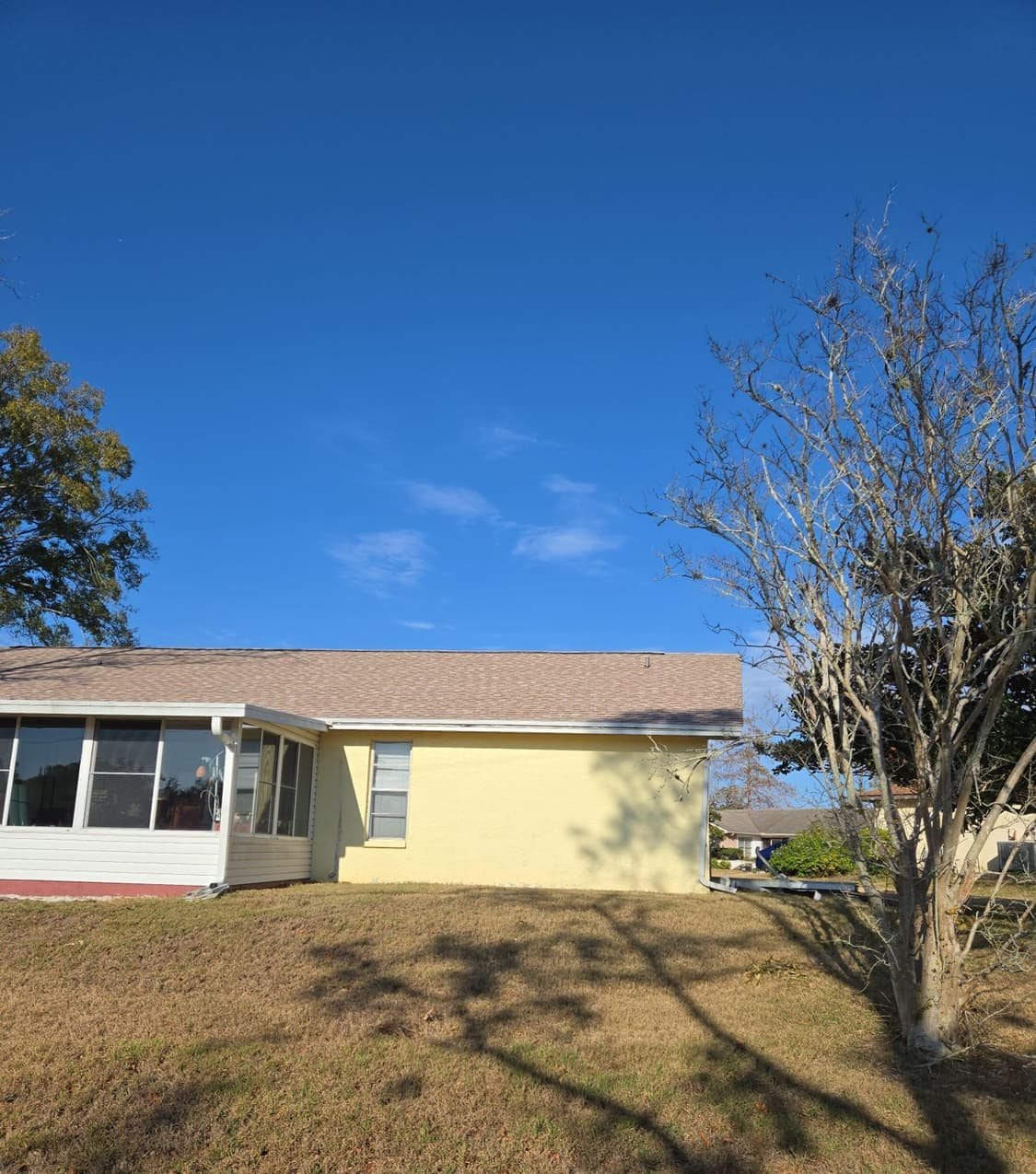 New architectural shingle roof on a Palm Harbor, FL home installed by Integrity Roofing of Florida