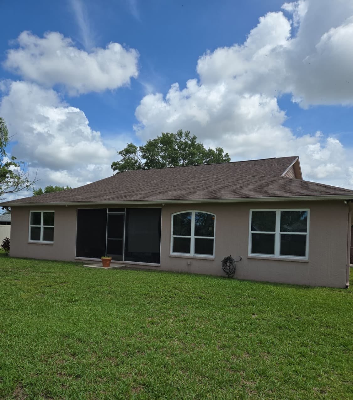 Finished shingle roof on a Palmetto, FL home by Integrity Roofing of Florida