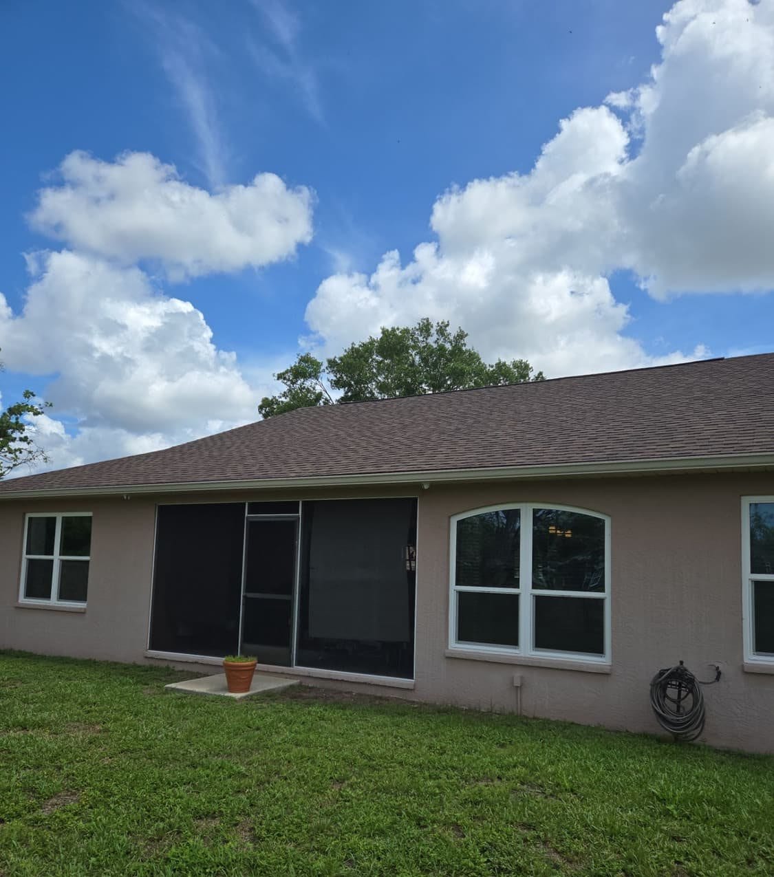 New architectural shingle roof on a Palmetto, FL home installed by Integrity Roofing of Florida