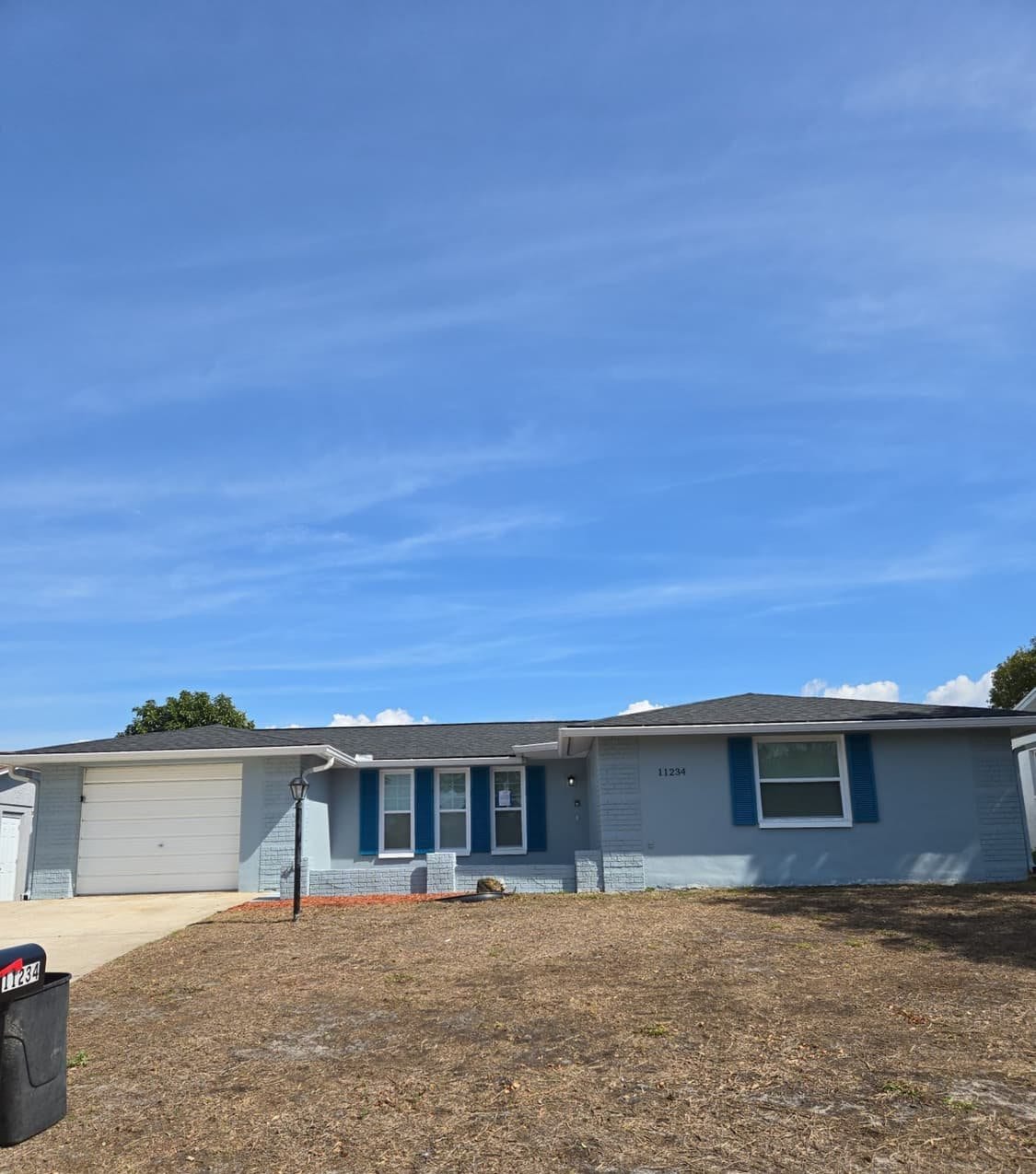 Finished shingle roof on a Port Richey, FL home by Integrity Roofing of Florida