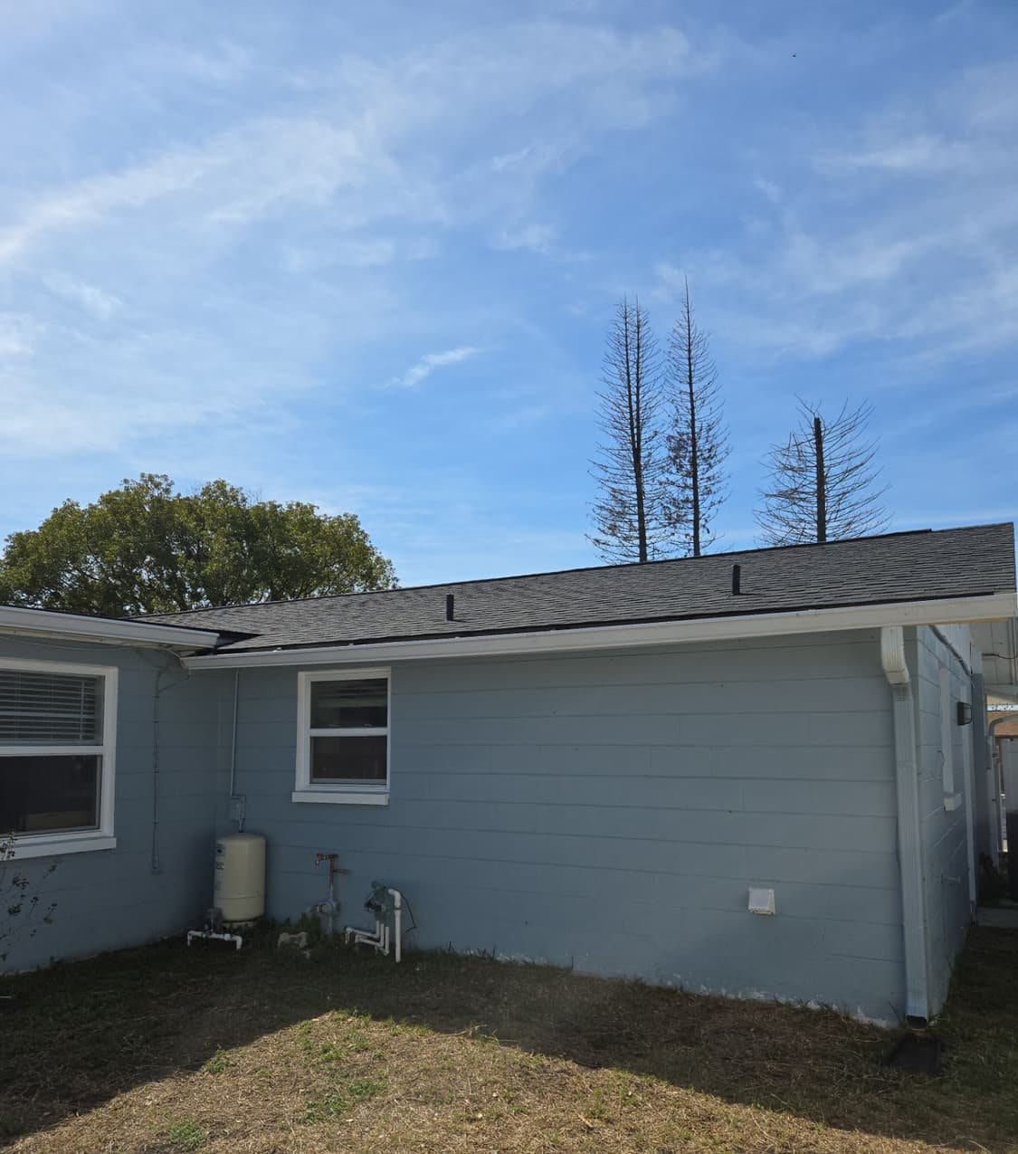 New architectural shingle roof on a Port Richey, FL home installed by Integrity Roofing of Florida