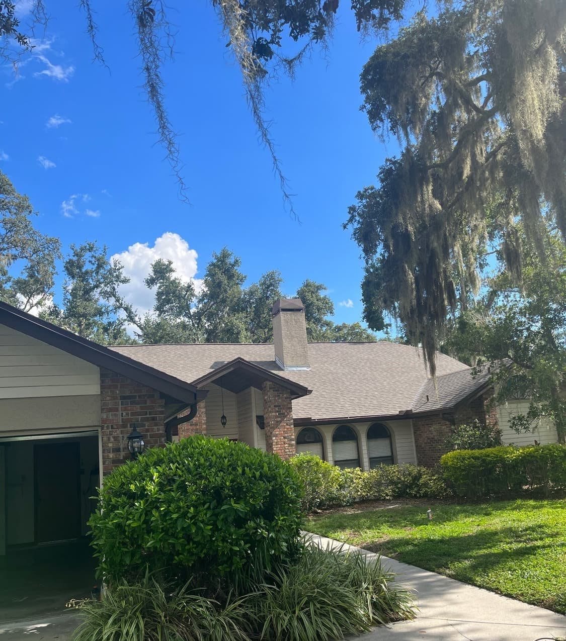 New architectural shingle roof on a Brandon, FL home installed by Integrity Roofing of Florida