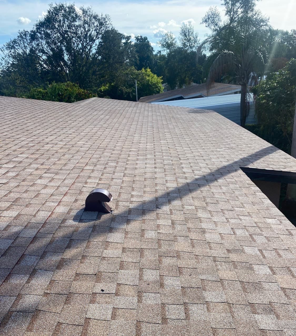 New architectural shingle roof on a Tampa, FL home installed by Integrity Roofing of Florida