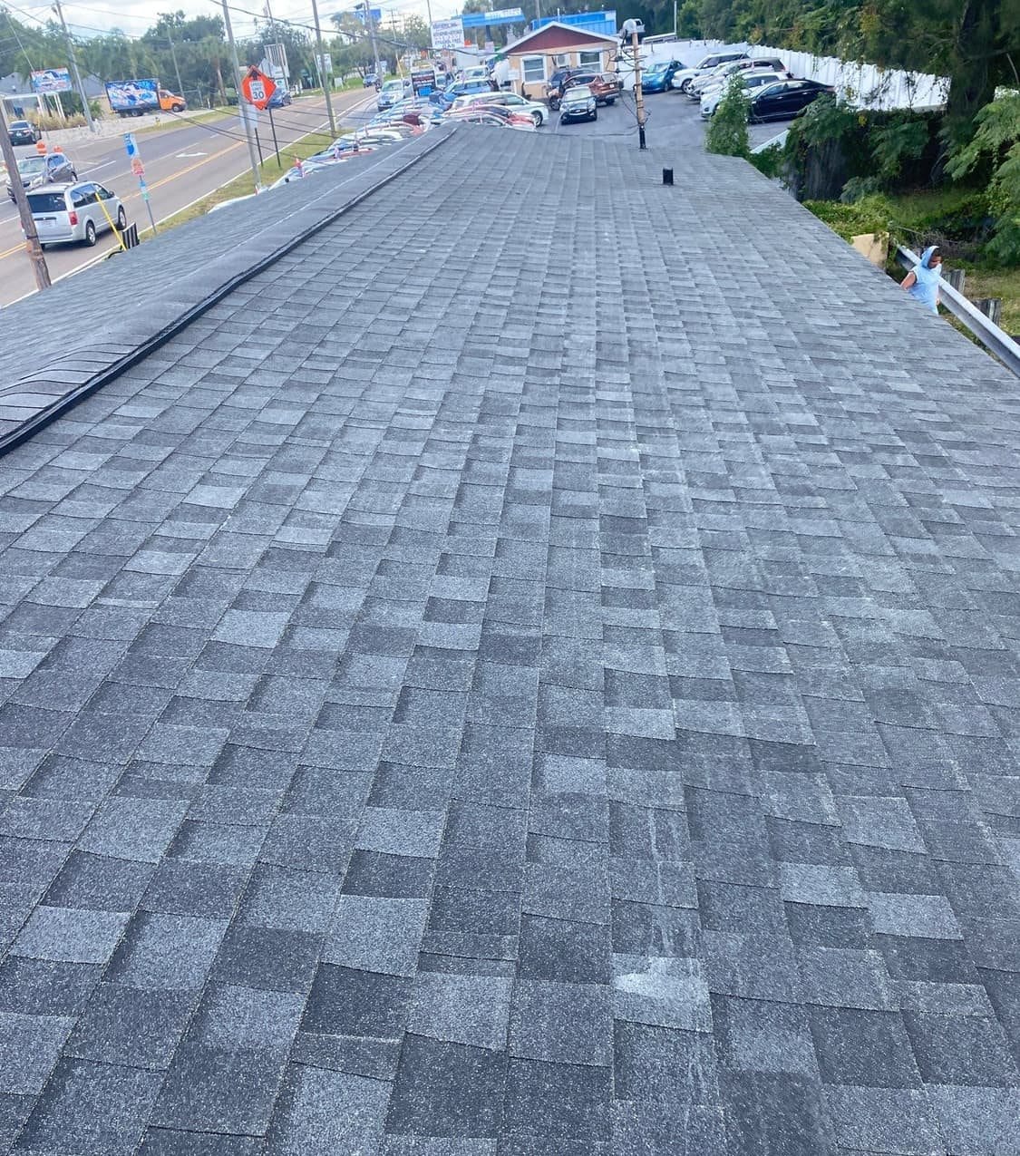New architectural shingle roof on a Tarpon Springs, FL home installed by Integrity Roofing of Florida