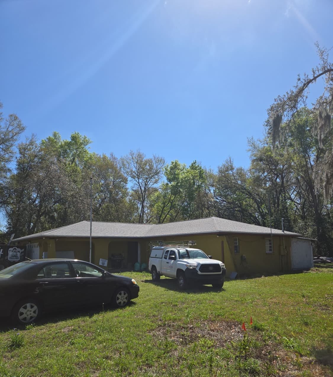 New architectural shingle roof on a Zephyrhills, FL home installed by Integrity Roofing of Florida